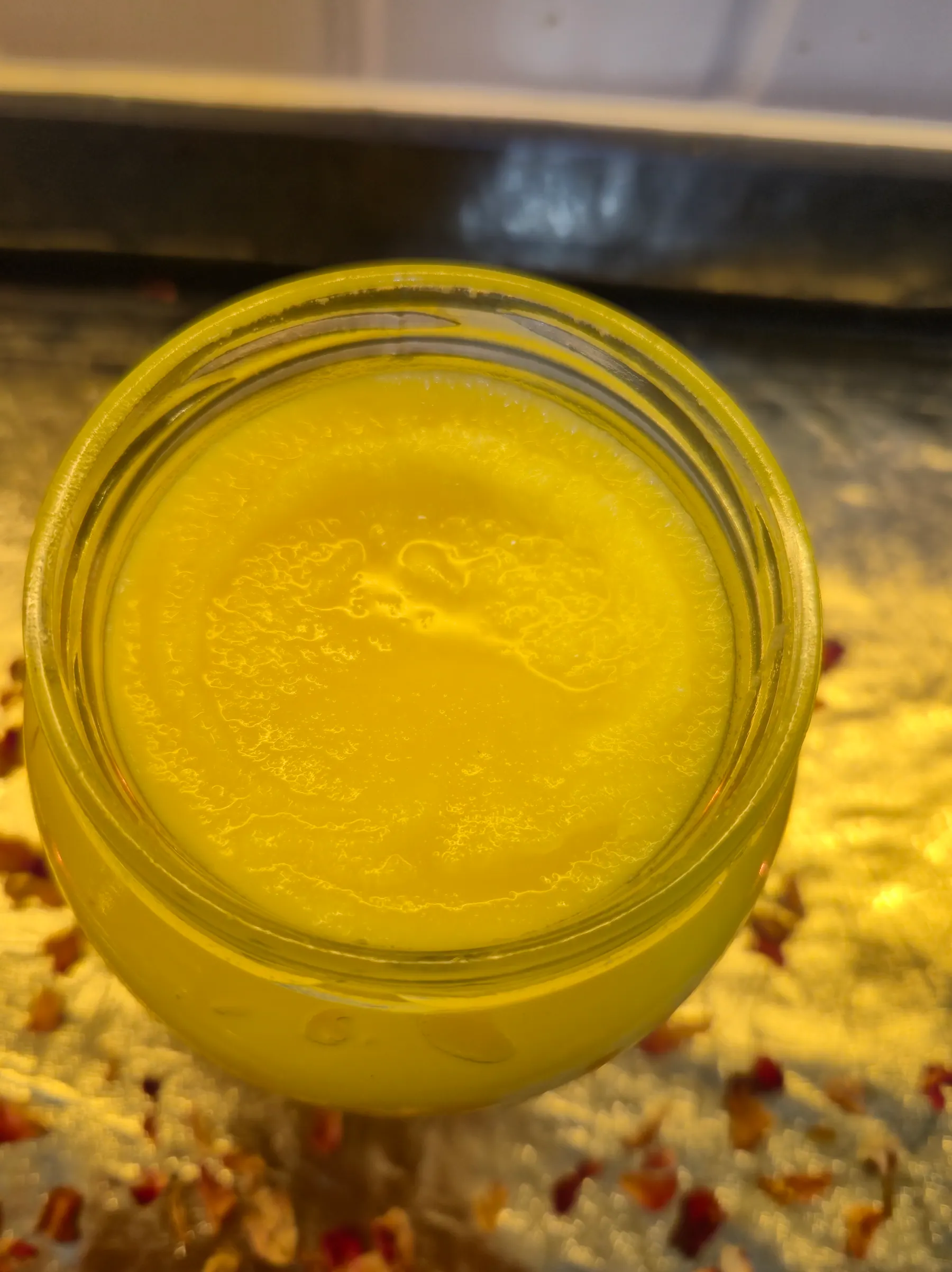 Close view of the natural golden texture of Khejari Farms ghee